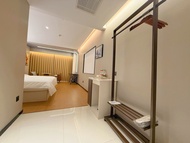 White Magnolia Hotel (Weihai Wendeng Kowloon City Branch)