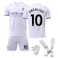 Manchesterss เสื้อแข่งฟุตบอลใส่ในเมืองสำหรับผู้ชายเด็กผู้ชายชุดถุงเท้าสั้นแขนสั้นเสื้อแข่งฟุตบอลขาวอ