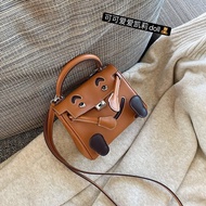 Racechoice น่ารัก กระเป๋าสะพายข้าง Mini Smiley Face ผู้หญิง Prank Kelly หนัง กระเป๋าถือ ทันสมัย ลำลอ