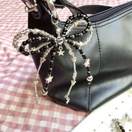 Black coquette bag charm