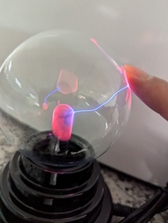 plasma ball light, touch control. USB powered, can use power bank. New in box. all works. Can ship s
