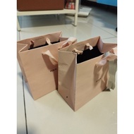 Tous small pink paper bags