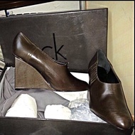 Brand new Calvin Klein Brown Wedge Boots