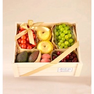 Fresh Fruits in wooden box