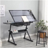 Drafting table with drawers and side table by Artist Loft Artist Loft Glass top adjustable drawing table, drafting table, toughened glass top art and craft table with 2 slide drawers and wheels