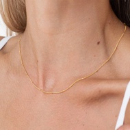 CARLIDANA | สร้อยคอครอสทรงกลมเม็ดเล็ก IPG14K แบบมินิมอล