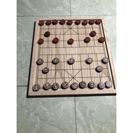 Russian wooden chess set includes chess pieces.