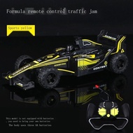 รถแข่งบังคับรีโมทสเปรย์ F1แบบชาร์จไฟได้กล่องของขวัญของเล่นรถยนต์ไฟฟ้าสำหรับเด็ก