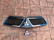 กระจังหน้า Taiton 2012 4WD (งานไทเท+เคฟล่า+โลโก้ หน้า หลัง)