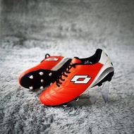 Lotto football boots with stitched soles around them neat