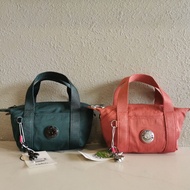 Kipling Kip Monkey Carry-on กระเป๋าสะพายหลังโทรศัพท์มือถือกระเป๋าเป้สะพายหลังไหล่เดียวเกี๊ยวกระเป๋าม