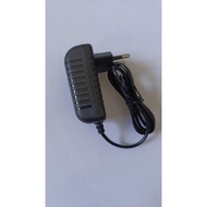 AC DC ADAPTER OUTPUT: DC 9V 500mA + C -