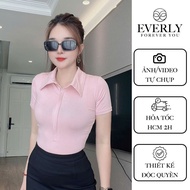Everly body-hugging collared t-shirt. Everly's figure-flattering zippered sleeve t-shirt. EV-91