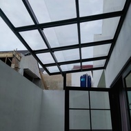 kanopi baja ringan solarflat terpasang kaca