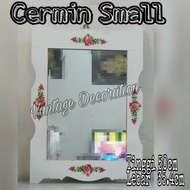 CERMIN VANTAGE HIASAN