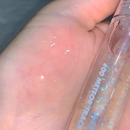 Transparent glitter lip gloss