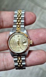 Rolex 勞力士Lady Datejust 179173女 裝電腦紋面鑽石字金鋼18K珠帶全原裝 有上行紙及原廠服務皮套,D頭2006 年,九成新,保證上行任驗,26mm女 裝款。