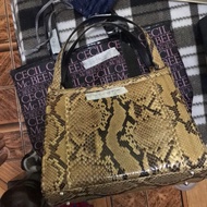 Cecil Mcbee and Snake bag sold to Sherielereg