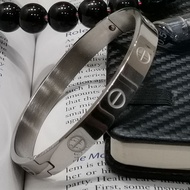 Mens Womens Stainless Steel 8mm Oval Shape Skru Signs Bangle.