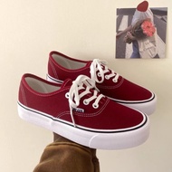 Vintage red canvas flat sneakers