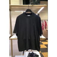 Ami เสื้อยืดแขนสั้นสำหรับผู้ชายและผู้หญิงของแท้ปักสีลูกอมใหม่ฤดูใบไม้ผลิและฤดูร้อนคอกลมหลวมน่ารักแบบ