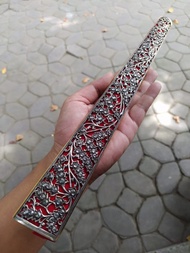 Pendok keris Bahan tembaga Model krawangan Mata batu yakut