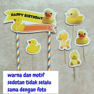 A set of Ducky yellow duck character cake topper birthday cake decorations