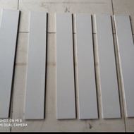 keramik putih list plint granit 10x50 poles cream list dinding/lantai