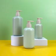Round green HDPE plastic bottle 200ml, 300ml, 500ml with rough brown tap using fi28 cap