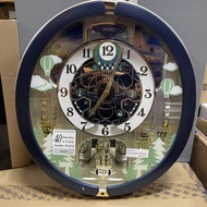Seiko Clock QXM398L Melodies In Motion Blue Case Modern Chime Analog Wall Clock QXM398