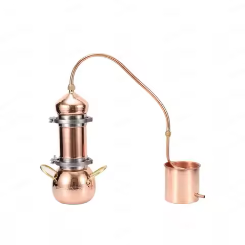 Copper still for home use; small, ancient distillation device with 2 liters; water pump and pipe inc