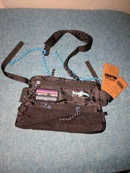 new with tags NWT Patagonia Ultralight bag with shoulder sling, Black Hole Mini Hip Pack