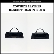 COWHIDE LEATHER BAGUETTE BAG IN BLACK