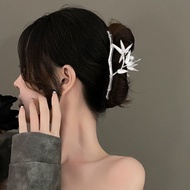 Women's metal hair clip with ancient leaves and branches