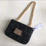 Tas Charles and Keith Glitter