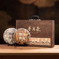 Tea Set of 2 Ancient Yunnan Pu-erh Cakes, Raw Pu-erh Tea and Luxurious Premium Ripe Pu-erh Tea.
