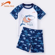 Bikini Kids (12-45kg) Bk22. Bộ đồ bơi ngắn tay với thiết kế họa tiết cá mập dành cho bé trai 12-45kg