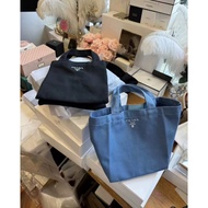 Black canvas handbag lwith box packaging