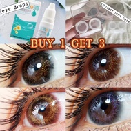 A pair of gold-dust contact lenses (yearly disposable, 14.2mm diameter, prescription range 0-800 deg