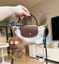 Longchamp mini dumpling bag, white Longchamp classic handbag, eco-friendly