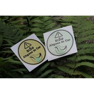 Sticker Ahgase in Car