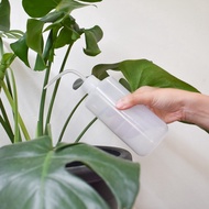 Watering squeeze bottle