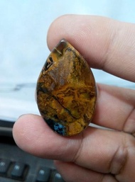 batu bacan coklat bergambar wajah asli