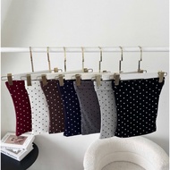 A15 Multi-colored polka dot tube top with stretchy form that hugs the body and flatters the figure