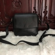 Della Stella Sling bag leather unisex preloved