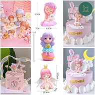 Angel baby decorates birthday cake, bunny ears baby, angel decorates cake