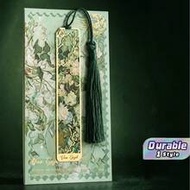 A Retro Floral Pattern Metal Bookmark, Featuring A Hollow-Out Gold-Stamped Design And Tassels. It's 