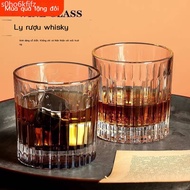 Creative vintage whiskey glasses, ice cubes, vertical pattern cocktails, ice, special glasses