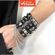 A set of 3 punk rock gothic black leather bracelets with chains and silver rivets, adjustable for bo