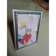 10R size photo frame includes frame and photo